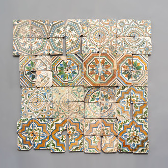 A varied collection of 64 polychrome tiles, Spain, 16th C.