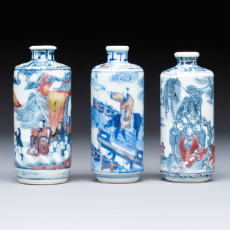 Three Chinese blue, white and copper-red snuff bottles, 19th C.