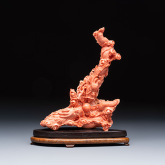 A Chinese carved red coral 'dragon' group, 19/20th C.