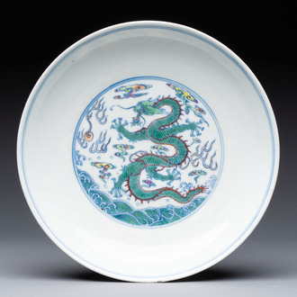 A Chinese doucai 'dragon' plate, Yongzheng mark and of the period
