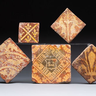 Five medieval slip-decorated tiles, France, Flanders and England, 15/16th C.