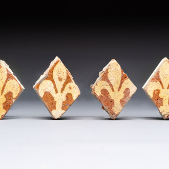 Four medieval slip-decorated ‘Fleur-de-Lys’ tiles, France, 15/16th C.