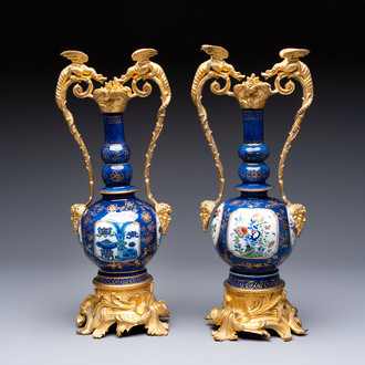 A pair of gilt-bronze-mounted Chinese famille verte powder-blue-ground double gourd vases, 19th C.