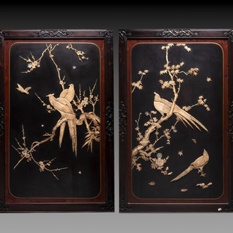 A pair of large Japanese bone-inlaid lacquered wooden panels with birds among flowering branches, 19/20th C.