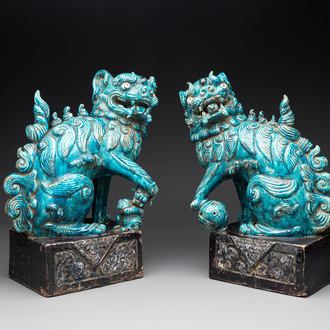 A pair of Chinese turquoise-and-aubergine-glazed Buddhist lions, probably Swatow kilns, 19th C.