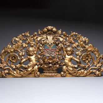 A baroque gilt carved wooden panel with an unidentified family crest, possibly Germany, 18th C.