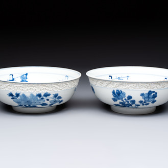 A pair of Chinese blue and white relief-border 'Lan Caihe' bowls, Kangxi