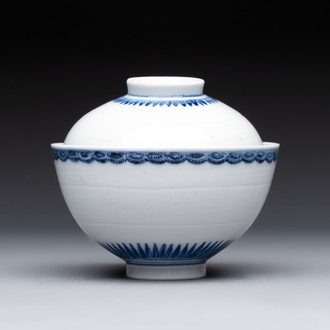 A Chinese blue and white covered bowl with incised floral design, Yongzheng/Qianlong