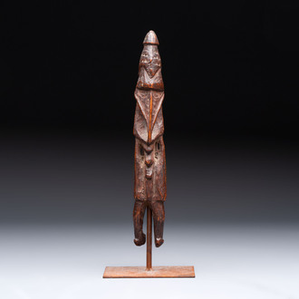 A Sepik Ramu wooden figure, Papua New Guinea