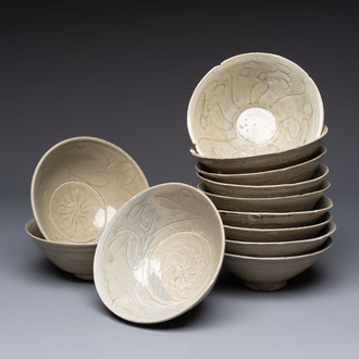 A group of 12 Chinese celadon-glazed bowls with incised floral design from the Jepara shipwreck, Fujian kilns, Song