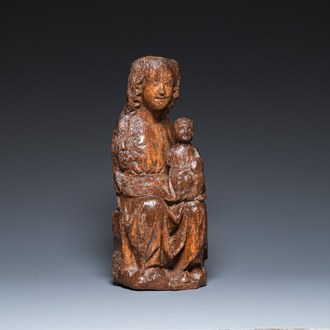 A carved oak 'Sedes Sapientia' or Madonna with child, France, 13/14th C.