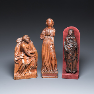 Three carved wooden sculptures of the Pensive Christ, Antonius the Great and a Saint, 16th C.