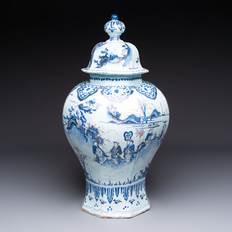 An exceptional blue, white and manganese Dutch Delft Transitional style chinoiserie vase and cover, 17th C.