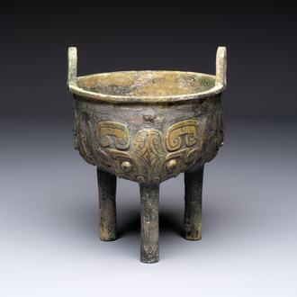 A Chinese archaic bronze food vessel with Taotie design, 'Ding 鼎', late Shang