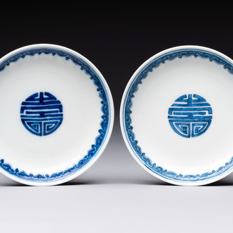 A pair of Chinese blue and white saucer dishes, Qianlong mark, 19th C.