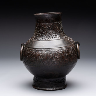 A Chinese archaistic bronze 'hu' vase with chilong design, Song/Yuan