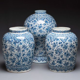 An exceptional large blue and white Dutch Delft garniture of three vases, late 17th/early 18th C.