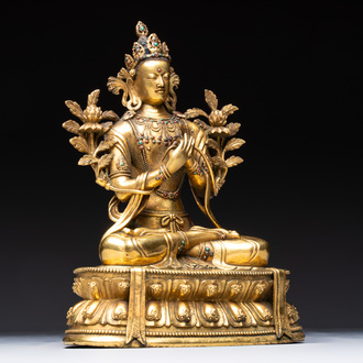 A fine Sino-Tibetan turquoise- and coral-inlaid gilt-bronze Buddha Maitreya, Kangxi