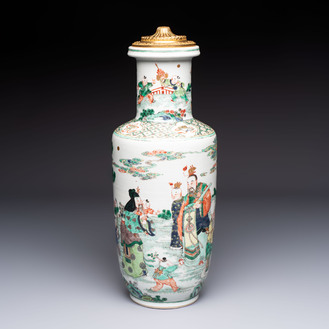 A fine Chinese famille verte 'Sanxing' rouleau vase with a gilt-bronze mount, Qing