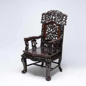 A richly carved Chinese hongmu 'dragon' armchair, Canton, 19th C.