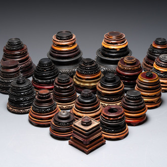 A large collection of 100 Chinese wooden stands, 19/20th C.