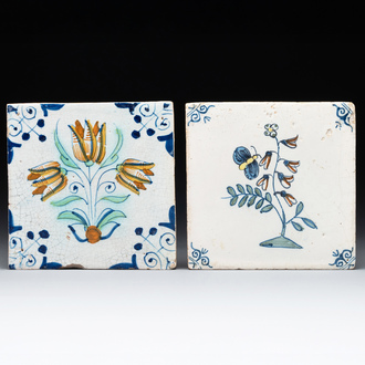 Two polychrome Dutch Delft 'flower' and 'butterfly and flower' tiles, 17th C.