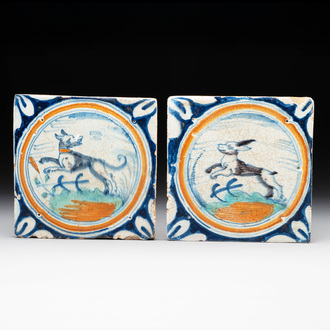 Two polychrome Dutch Delft maiolica 'dog' and 'hare' medallion tiles, late 16th C.