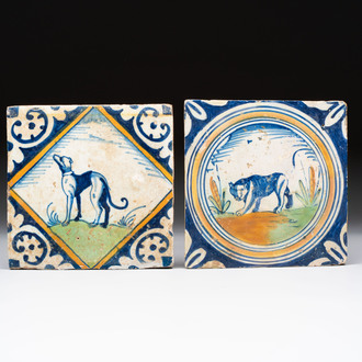 Two polychrome Dutch Delft maiolica 'dog' and 'panther' tiles, late 16th C.