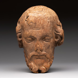 A carved limewood bearded male head, Germany, 18th C.