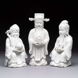A set of three Chinese Dehua blanc de Chine 'Sanxing' figures, 20th C.