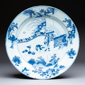 A large blue and white Dutch Delft chinoiserie dish, 17th C.