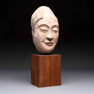 A Thai polychrome stucco head of Buddha, Ayutthaya Kingdom, 16/17th C.