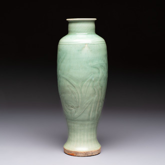 A Chinese Longquan celadon vase with incised floral design, Transitional period