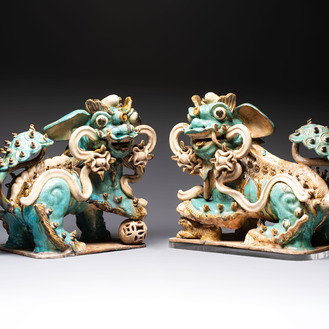 A pair of large Chinese polychrome-glazed Shiwan stoneware Buddhist lions, 19th C.
