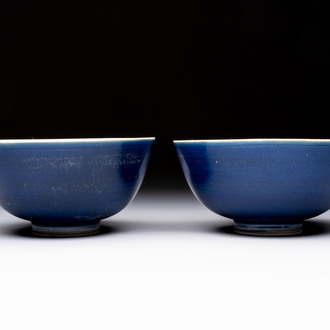 A pair of Chinese blue-glazed 'Hatcher Cargo' bowls with incised dragons, Transitional period