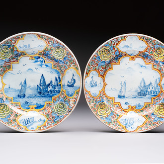 A pair of fine polychrome Dutch Delft 'Coastal View' plates, 18th C.