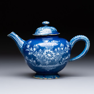 A Nevers white-decorated blue-ground faience teapot and cover, France, 18th C.