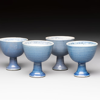 Four Chinese blue-glazed 'Hatcher Cargo' stem cups, Transitional period