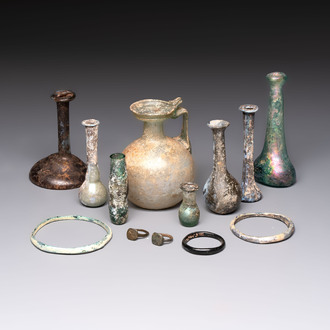 Eight Roman glass flasks, three glass bracelets and two bronze rings, 1st/4th C.