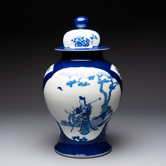 A Chinese blue and white powder-blue-ground 'He Xiangu 何仙姑' vase and cover, 19th C.