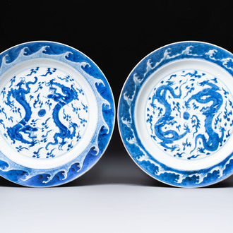 A pair of Chinese blue and white 'Dragon' dishes, Chenghua mark, Kangxi