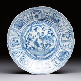 A Chinese 'Kraak' blue and white 'Hatcher Cargo' plate, Wanli