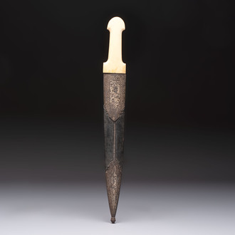 A Caucasian gilt Damascus steel 'Khinjal' with a whale bone hilt and a leather and damascened steel scabbard, 19th C.