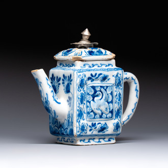 A rare blue and white Dutch Delft relief-moulded teapot and cover, late 17th C.