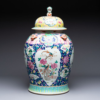 A large Chinese famille rose vase with lion-form handles and cover, 19th C.