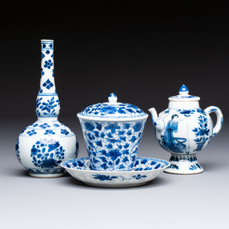 A Chinese blue and white covered ewer, a rose water sprinkler, a covered cup and saucer, jade 玉 and twin-fish mark, Kangxi