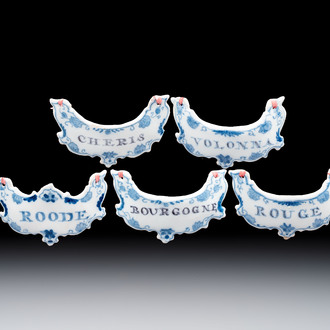 Five blue and white Dutch Delft 'Wine' labels, 18th C.