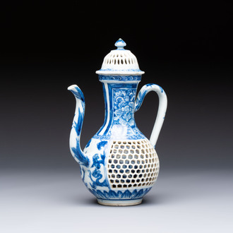 A rare Chinese blue and white reticulated double-walled ewer and cover with floral design, Kangxi