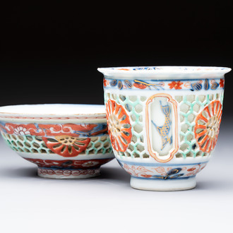 A rare Chinese famille verte reticulated double-walled cup and saucer, artemisia leaf mark, Kangxi
