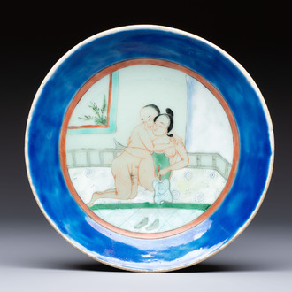 A Chinese famille verte 'Erotic Subject' plate, 19th C.